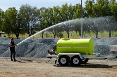 Fire Water Trailer spraying and watering down dust suppression